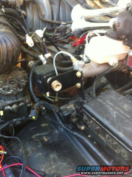 re-did the mount for the check valve 3/2012.  This set up is very superior to the crap i had before.  Bolts to the bracket that holds the engine fuse box.