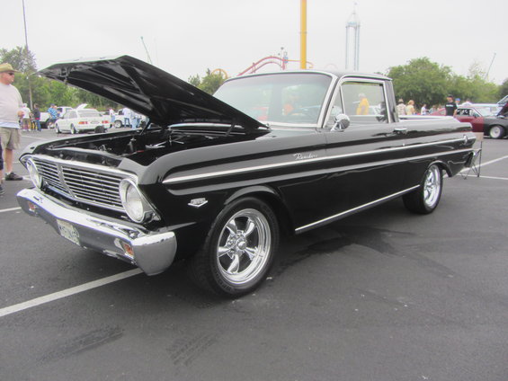 Black 1963 Ford Falcon Ranchero with hood open, parked outside