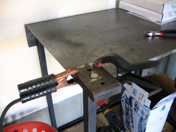 procomp-leafs-019.jpg With the zero rate I just drilled out the center hole for the leaf pin that goes to the axle spring plate to 9/16ths and used a 9/16ths grade 8 bolt I cut the treads off of, and then was preparing to tack weld the bolt head into the zero so it wouldn't move any (not sure that was needed but I did it anyway).