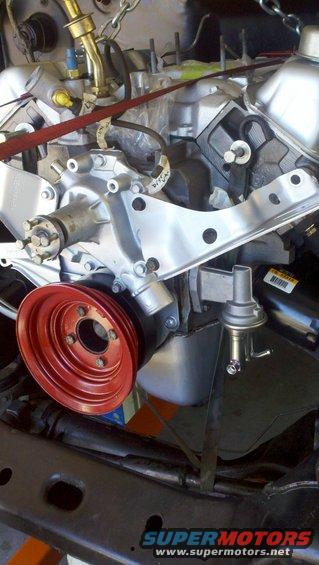 Engine motor rebuild with red pulley and fuel pump