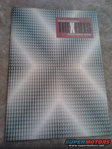 X Files document with a pixelated background and red title block