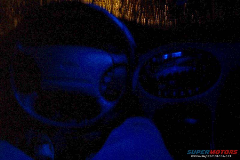 Interior dashboard with blue LEDs and steering wheel