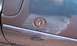 1997 Ford Probe - Close-up of a car's door lock cylinder.