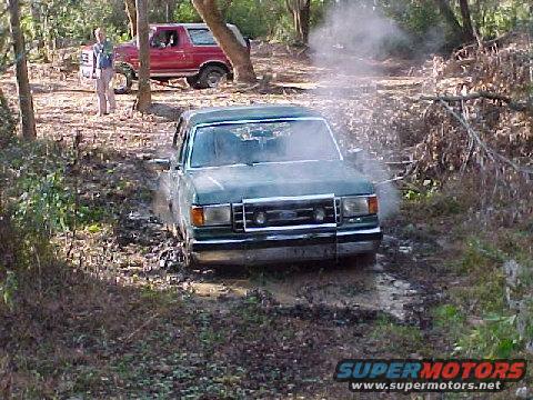 stuck.jpg Stuck, errr... Letting my baby cool off. Exhause under water, couldn't keep it running, had to be towed out :(