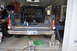 1986 Ford Bronco - The interior of this Ford Bronco is being worked on, with tools and equipment scattered inside the cabin and bed.