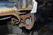 1986 Ford Bronco - The vehicle's frame is severely corroded, indicating extensive rust damage.