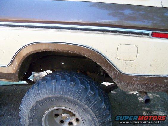 Close-up of the rear wheel well and tire on a 1978 Ford Bronco