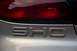 1998 Ford Taurus - The rear of a silver car displays the 'SHO TAURUS' badging, indicating a specific trim level.