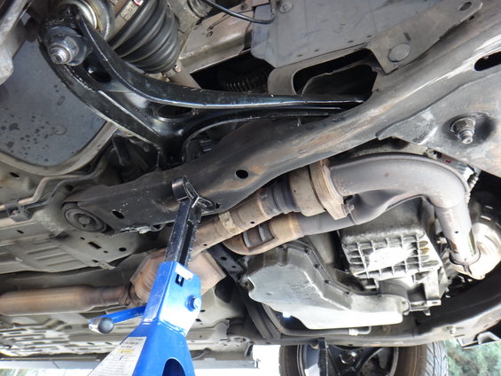 Front lower control arm and ball joint assembly on a 2003 Ford Taurus