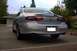 1998 Ford Taurus - This 1998 Ford Taurus SHO is parked in a driveway with a house and trees in the background.