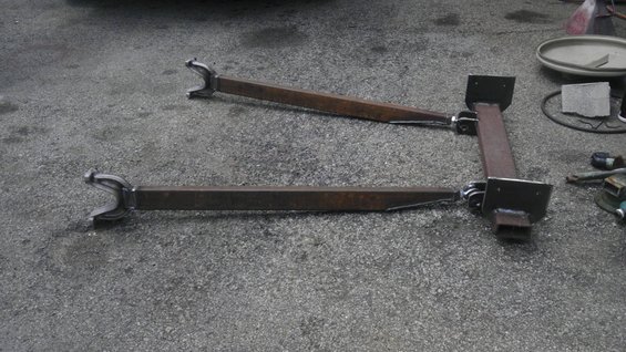 Custom front suspension components with C-shaped ends and square tubing