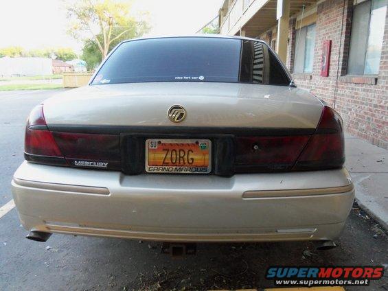 Silver 2000 Mercury Grand Marquis rear view with a license plate reading ZORG