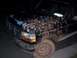 1992 Ford Bronco - This truck has clearly seen some off-road action, judging by the extensive mud splatter.