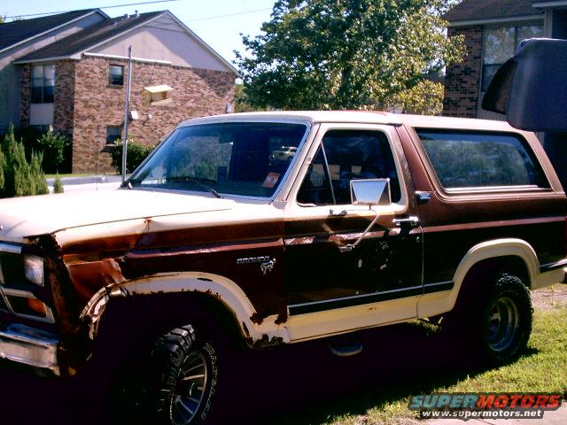 Brown and white 1980 Ford Bronco side view