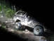 1992 Ford Bronco - This Ford Bronco navigates a challenging rocky off-road path.
