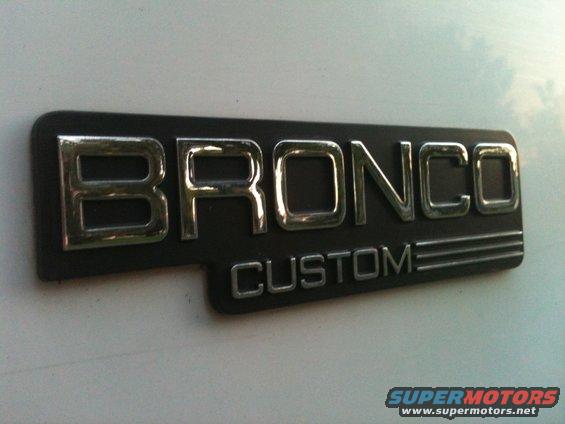 Bronco Custom badge on a white surface
