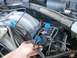 1992 Ford Bronco - Close-up view of engine bay components, including wiring and electrical modules.