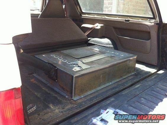 1996 Ford Bronco interior showing custom fuel tank installed in cargo area
