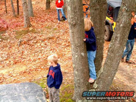 My kids. Joey and Jessica, watching some of the trucks climbing a hill.