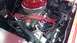 1964 Ford Fairlane - Close-up view of a vehicle's engine compartment, showing various components and wiring.