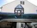 1992 Ford Bronco - A black light bar mount is affixed to the roof of a dark green vehicle.