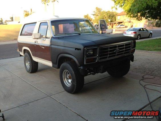1982 Ford Bronco parked on driveway, front passenger side view
