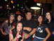 2012 Ford Bronco - A group of five people pose for a photo while gathered at a bar.