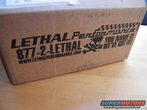 Cardboard box with Lethal Performance logo, phone number, and website