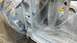1983 Ford Bronco - The interior of a vehicle is covered in plastic and tape, preparing for a paint job.