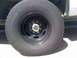 1997 Dodge 3500 - Close-up of a truck wheel and tire, showing the brand and size information.