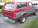 1994 Ford Bronco - This 1994 Ford Bronco features a two-tone red and grey paint scheme and a removable rear cap.