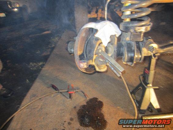Welding a suspension part on a vehicle