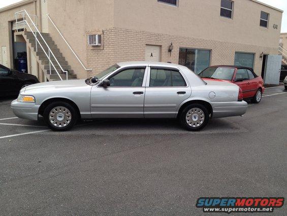 Silver 2005 Ford Crown Victoria sedan, side view