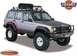 1980 Jeep Cherokee - This Jeep Cherokee features aftermarket fender flares and a roof-mounted spare tire.