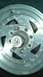 1989 Ford Bronco - A close-up view of a vehicle's wheel hub and lug nuts, showing wear and tear.