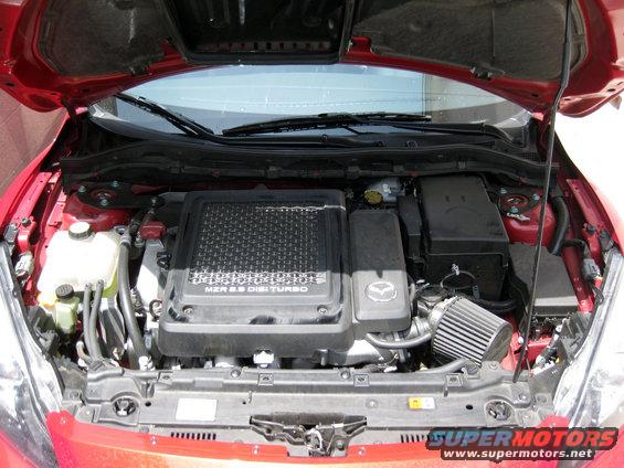 Red Mazda engine bay with MZR 2.3 DISI TURBO engine cover and aftermarket air filter