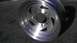 1989 Ford Bronco - Close-up of a single aluminum alloy wheel with a distinctive spoke design.