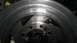 1989 Ford Bronco - Close-up view of a custom aluminum wheel, not identifiable as a 1989 Ford Bronco part.
