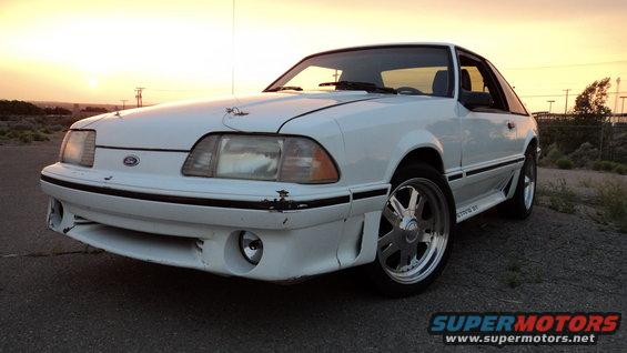 White 1989 Ford Mustang GT coupe with aftermarket wheels