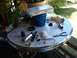 1989 Ford Probe - Various fuel pump components, including a new pump and filter, are spread across a table, suggesting a repair or replacement project.