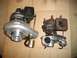 1989 Ford Probe - Comparison of two turbochargers, one appears newer and cleaner than the other.