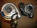 1989 Ford Probe - Comparison of two turbochargers, one with a blue identification tag and A/R.50 specification.