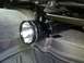 2011 Ford Ranger - A Maglite flashlight is mounted beneath a vehicle's seat, attached to the seat's support structure.
