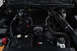 2004 Ford Crown Victoria - The engine bay of a 2004 Ford Crown Victoria P71 is shown, the engine and various components.