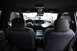 2004 Ford Crown Victoria - Interior view of a 2004 Ford Crown Victoria police car, equipped with a laptop and console.