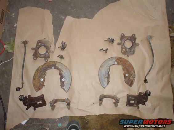 dsc00779.jpg These are the parts I got from the junk yard to accomplish my drum - disk brake conversion.