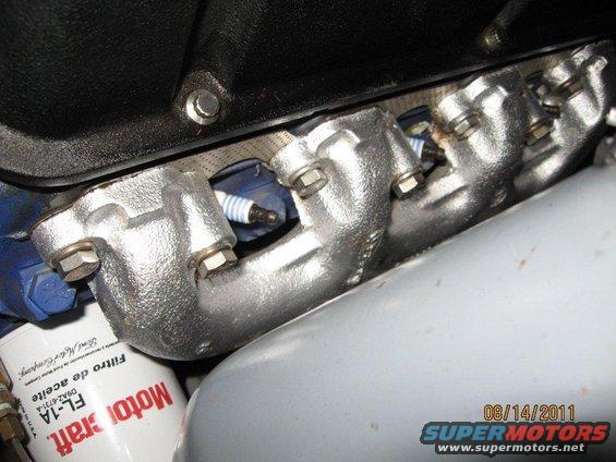 img_0354.jpg Exhaust manifold AFTER painting with Rust-Oleum silver oil-based paint. NOT high-temp. has lasted over two years now. Big difference.