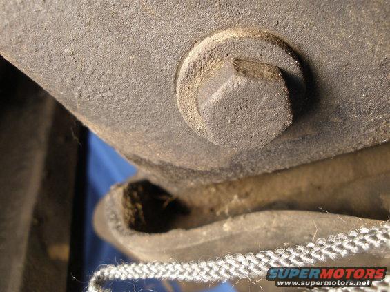 Bolt head on a vehicle frame