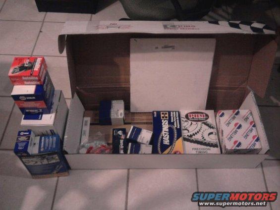 Engine parts including Hastings timing set and Melling components in boxes