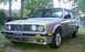 1989 BMW 3 Series - This BMW sedan's body style suggests an earlier model year than claimed, with its distinct grille and headlight configuration.